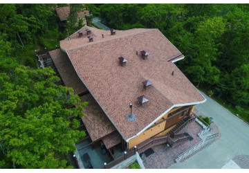 Установка бітумної черепиці на дах будинку ТехноНІКОЛЬ Shinglas Джаз Терра
